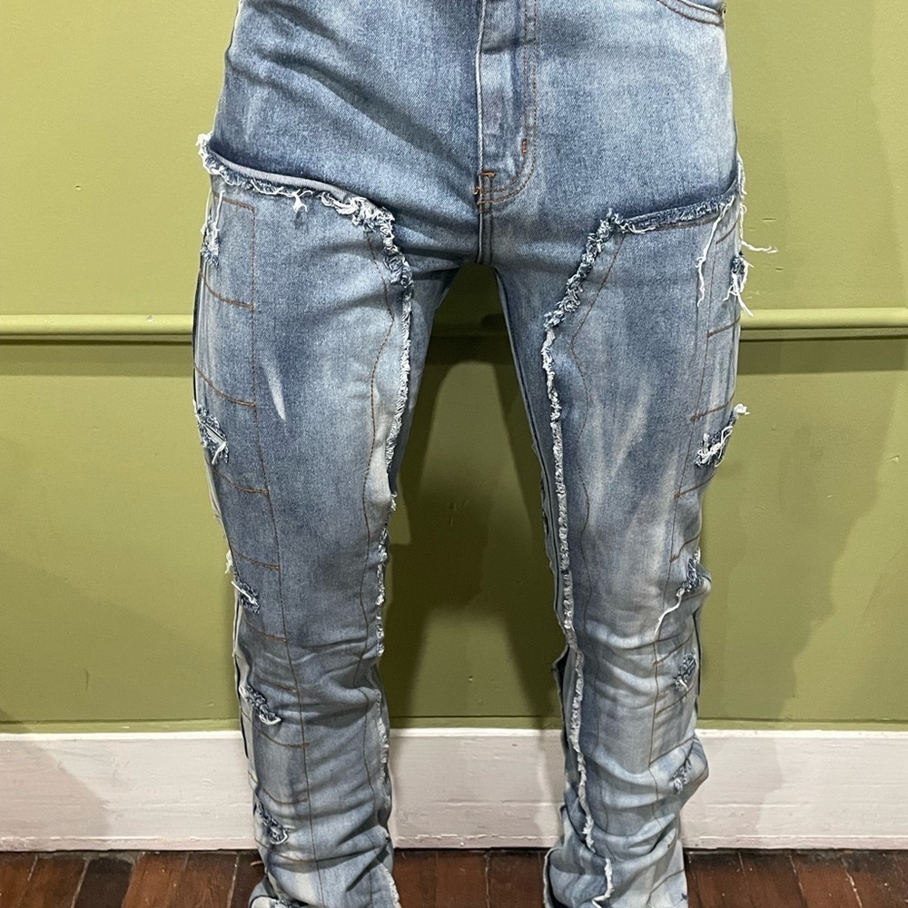 Blue Skinny Jeans with Distressing and Faded Look stacked slim fit